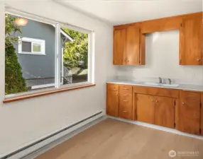 Formica countertops & wooden cabinetry