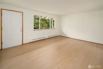 New waterproof luxury vinyl plank in living room, kitchen and hall