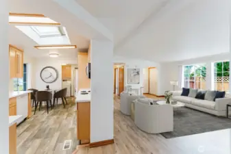 Kitchen with eat-in area and living room.