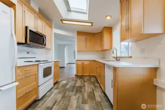 Kitchen looking towards dining area and den.