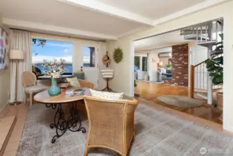 Warm hardwoods blend seamlessly with brick fireplace.