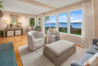 Abundant natural light with large view windows and sliding door.