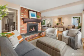 Easy flow and open feel from entry, living room, kitchen and dining area.