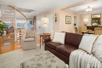 Cozy dining area off the kitchen with seating area beyond give an open concept feel.