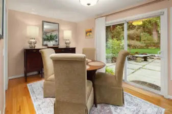 Dining area with direct outdoor access to patio for extended entertaining or family space.