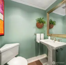 Half bath downstairs for guest access.