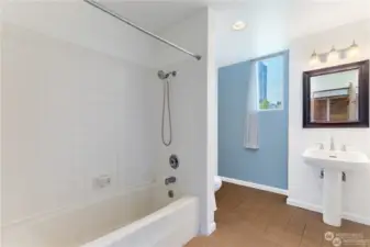 This bathroom is huge like a hotel bath.