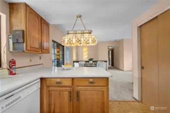 The breakfast bar looks into the dining area and welcomes guests.