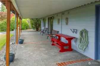 The deck has a waterproof cover that provides weather protection for the lower view patio.