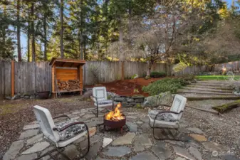 So many options in this backyard, including this firepit area.