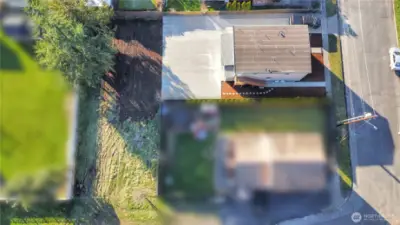 Extra lot on left along with fourplex