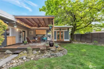 Outdoor covered patio and detached office space.