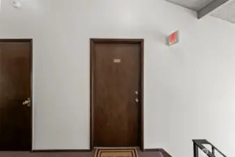 Open the front door to the neat and clean condo.