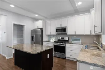 Open kitchen with walk-in pantry