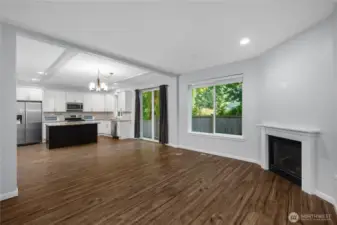 Open concept living room with high ceilings