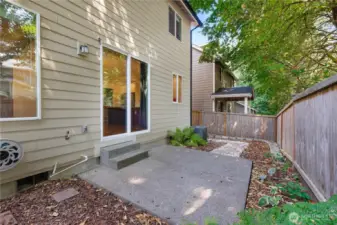 Fully fenced backyard w/ patio