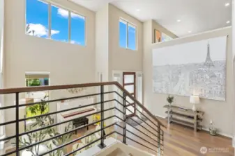 Two-story foyer and living room.