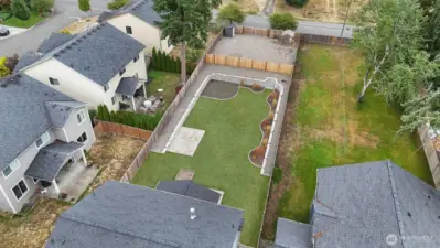 The additional fenced area features a green house and shed, ready for your gardening, hobbies and projects. Conduit is also run for optional power to the back area!