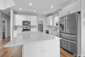 From an under-counter farm style sink, to an open design and stylish cabinetry, this kitchen offers both functionality and style.