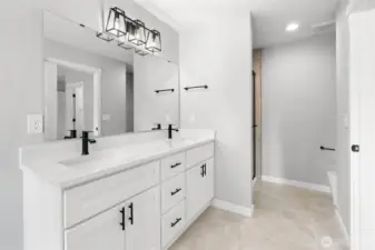 The dual sink vanity offers functionality and storage.
