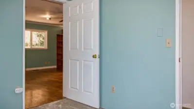 Looking from bonus room to addition that has a BR, kitchenette, walk-in closet, and full bath, with separate entrance from back yard.