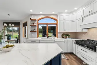 The durable Dekton countertops will stand up to whatever you throw at them, or on them!