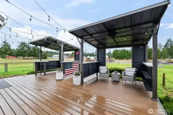 This deck is the perfect place to grill, complete with bistro lights for ambiance