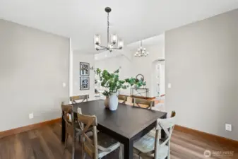 The formal dining room sits proudly off the foyer with enough space for the table of your dreams