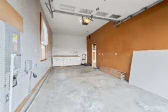 The third bay has been converted to a shop but can easily be used for vehicles - or maybe the spot for your perfect home gym!