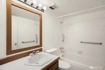 The guest bath features a full tub/shower combo and plenty of storage.