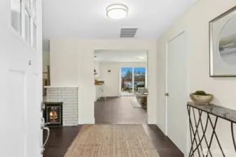 Wonderful open entry showing off the real hardwood floors throughout.