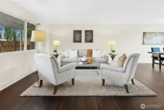 Very spacious living/dining area with wood burning fireplace.