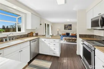 Kitchen opens to the family room. This home has a great layout!