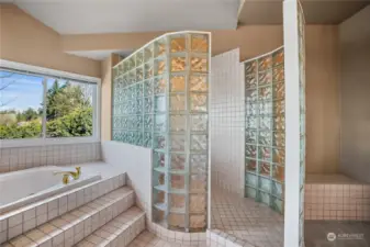 Cubed Glass shower space and sitting area.