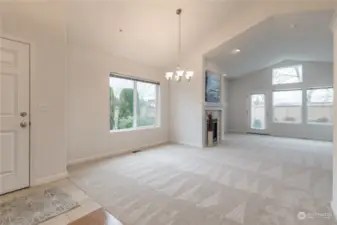 Dining and living rooms just off the entry. Brand new carpet throughout the home!