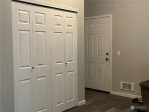 Utility Closet and garage entry from Family room.