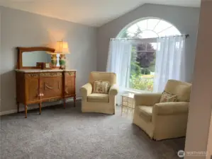 Open and bright living room with vaulted ceilings