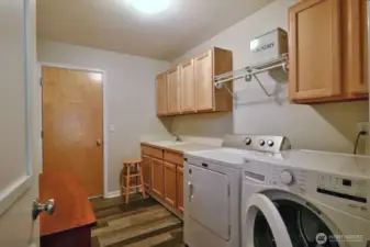 Large Utility room ,door leads to 3 car garage