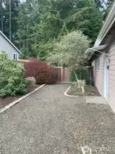 Side yard, gate opens to backyard AC located to right of gate