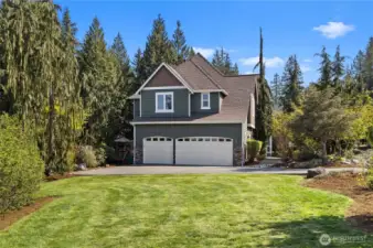 3 car garage & yard