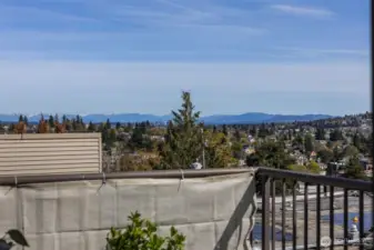 Balcony view of Bellevue & The North Cascade Mountains