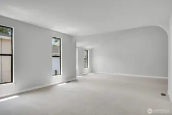 Step into the expansive primary bedroom—spacious enough to accommodate a private sitting area.