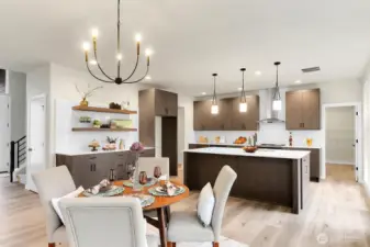Photo is from another home in the plat but is representative of the style and finishes that will be at Lot 3.