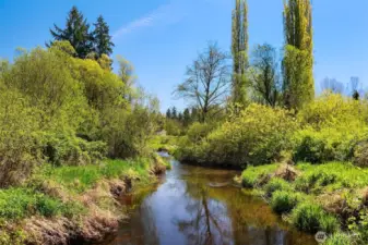 A rare Redmond Acreage Rambler on 3+ acres of peacefulness. Cross over the babbling brook to find your garden oasis where option abound.