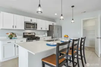 Pendant lights, basin sink, gas stove...