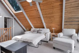 The loft has additional sleeping space for guests.