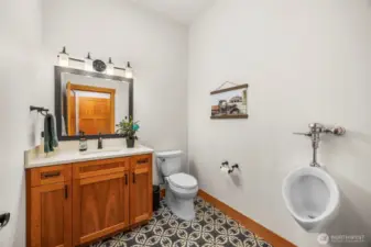 Half bath conveniently located near garage entrance