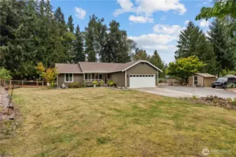 Home w/7-Year Old Roof, Greenhouse w/Power and Tons of Parking!