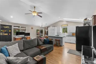 Living Room w/Newer Laminate Floors, Vaulted Ceiling, Ceiling Fan and Updated Kitchen!