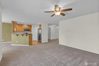Family room looking towards kitchen with breakfast bar